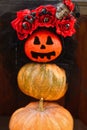 Scary background for Halloween from pumpkins and cobwebs, lace and roses. Royalty Free Stock Photo