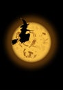 SCARY BLACK WITCH ON A BROOM INFRONT OF THE BIG SHINING MOON IN HALLOWEEN MYSTIC NIGHT