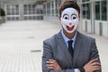 Scary businessman wearing a mask Royalty Free Stock Photo