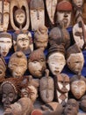 Scary carved African face masks on sale in medina, Essaouira, Morocco