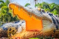 Scary Chalawan crocodile statue at Bueng Si Fai, the public park with lake at Muang district, Pichit province, Thailand. Chalawan Royalty Free Stock Photo