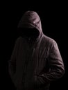 Scary and creepy man hiding in the shadows Royalty Free Stock Photo