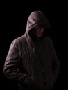 Scary and creepy man hiding in the shadows Royalty Free Stock Photo