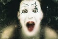 Scary face screaming mime