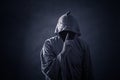 Scary figure in hooded cloak Royalty Free Stock Photo
