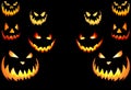 Scary glowing eyes and teeth of Halloween pumpkins.