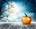 Scary Halloween background with pumpkin and moon. Royalty Free Stock Photo