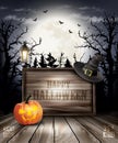 Scary Halloween background with pumpkin and wooden sign