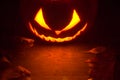 Scary halloween night with spooky evil face of jack o lantern at the top