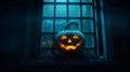 Scary Halloween pumpkin in the mystical house window at night or halloween pumpkin in night on abandoned room with window. Royalty Free Stock Photo