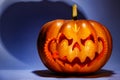 Scary Halloween pumpkin resembling a Chinese dragon head, with a