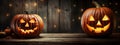 Scary Halloween pumpkins on vintage dark wood background, banner