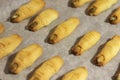 Scary happy Halloween baking finger cookies with pumpkin seeds