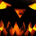 Scary head inside a lit up pumpkin