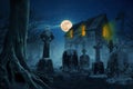 Scary house in the forest near the cemetery at night with a full moon and stars. Halloween idea concept Royalty Free Stock Photo