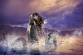 Scary Loch Ness Monster emerging from water Royalty Free Stock Photo