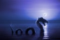 Scary Loch Ness Monster emerging from water Royalty Free Stock Photo