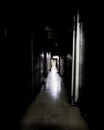 Scary long dark hallway Royalty Free Stock Photo