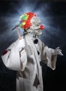 Scary monster clown with hammer Royalty Free Stock Photo