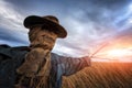 Scary scarecrow in a wheat field at sunset Royalty Free Stock Photo