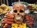 Scary skeleton covered in meat