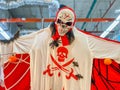 Scary skeleton halloween costume hanging on ceiling Royalty Free Stock Photo