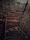 Scary stairs to basement in forgotten building