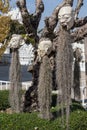 Scary Stone - rock sculptures of giant heads carved into the sandstone cliff