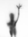 a scary thriller blurry shape figure black and white shadow haunted on halloween