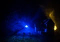 Scary view of zombies at cemetery dead tree, moon, church and spooky cloudy sky with fog, Horror Halloween concept