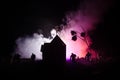 Scary view of zombies at cemetery dead tree, moon, church and spooky cloudy sky with fog, Horror Halloween concept Royalty Free Stock Photo