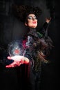 Scary witch summoning a spell Royalty Free Stock Photo