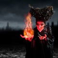 Scary witch summoning a spell Royalty Free Stock Photo