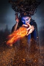 Scary witch summoning a spell Royalty Free Stock Photo