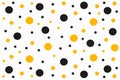 Scattered black and yellow circles of different sizes on a white background. seamless polka dots is a modern pattern.white