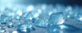 Scattered blue ice shards on reflective surface. Light refracts through transparent crystal fragments creating soft glow. Cool Royalty Free Stock Photo
