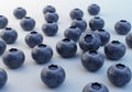 Scattered Blueberries on White Surface Fresh Fruit Arrangement Royalty Free Stock Photo