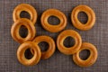 Scattered bread rings on mat. Top view Royalty Free Stock Photo