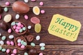 Scattered candies and Easter card. Royalty Free Stock Photo