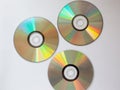 3 scattered cd compact disk with music on a white background Royalty Free Stock Photo