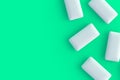 Scattered chewing gums. Mint bubblegums. Space for text Royalty Free Stock Photo