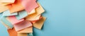 Scattered colorful paper notes on a plain background, representing ideas and inspiration for projects. Royalty Free Stock Photo