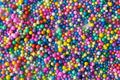 Scattered colorful styrofoam balls as a background