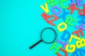 English alphabets with magnifying glass Royalty Free Stock Photo