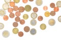 Scattered euro coins isolated on a white background