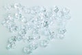 Scattered glass diamond chunks on a white background Royalty Free Stock Photo