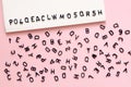 Scattered letters, alphabet on pink background, write, read, grammar concept, Choose a security password