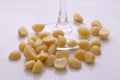 Macadamias around the stem of a glass Royalty Free Stock Photo