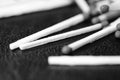 Scattered matches on dark background. Black and white Royalty Free Stock Photo