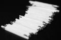 Scattered matches on dark background. Black and white Royalty Free Stock Photo